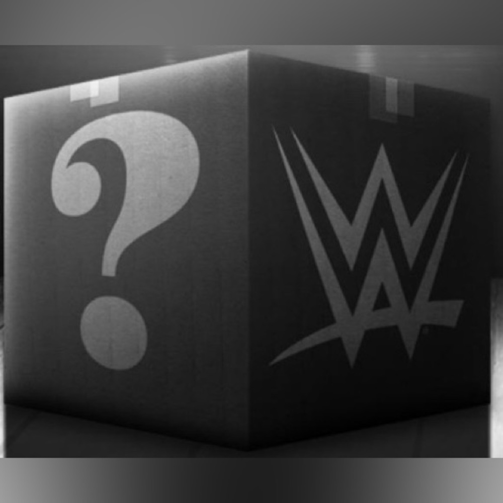 Wrestling mystery box!! Featuring MOC figures, loosies, magazines, dvds ect!!